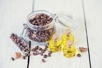 Image showing The cedar oil in a glass bottle