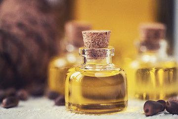 Image showing The cedar oil in a glass bottle