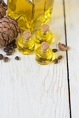 Image showing The cedar oil in a glass bottle