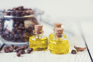 Image showing The cedar oil in a glass bottle