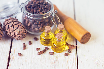 Image showing The cedar oil in a glass bottle