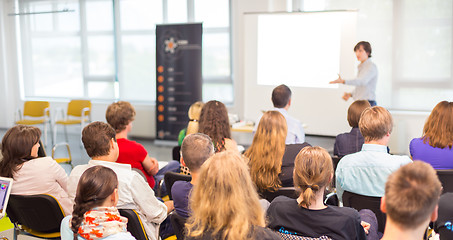 Image showing Woman giving presentation on business conference.