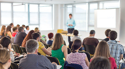 Image showing Speaker giving presentation on business conference.