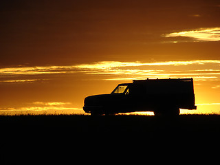 Image showing  Old vehicle at sunset