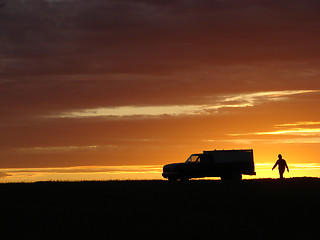 Image showing  Old vehicle at sunset