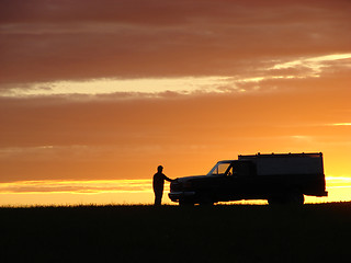 Image showing  Old vehicle at sunset