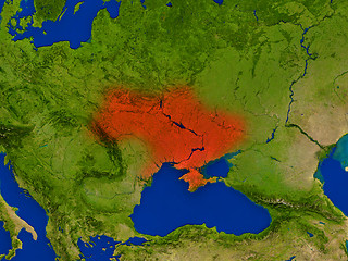 Image showing Ukraine from space in red