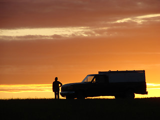 Image showing  Old vehicle at sunset