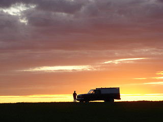 Image showing  Old vehicle at sunset