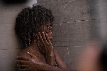 Image showing African American woman in the shower