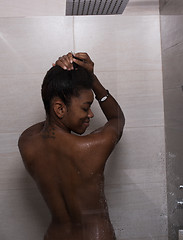 Image showing African American woman in the shower