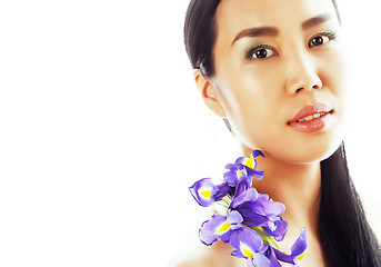 Image showing young pretty asian woman with flower orchid close up isolated sp