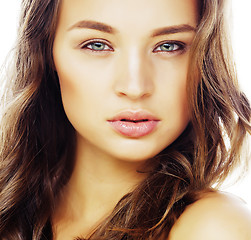 Image showing young sweet brunette woman close up isolated on white background