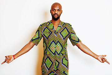 Image showing portrait of young handsome african man wearing bright green nati