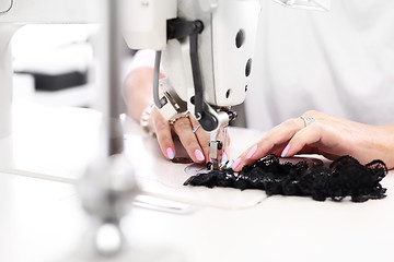 Image showing Sewing. Factory, sewing room. Production of apparel.