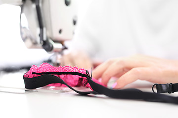 Image showing Factory, sewing room. Production of apparel. Occupation needlewoman.