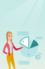 Image showing Business woman pointing at pie chart.