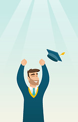 Image showing Graduate throwing up graduation hat.