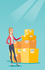 Image showing Business woman checking boxes in warehouse.