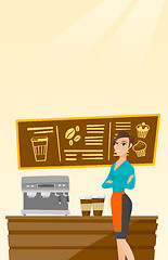 Image showing Barista standing near coffee machine.