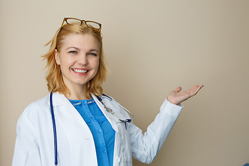 Image showing Young doctor on empty background