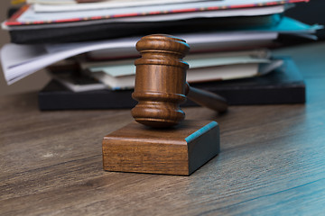 Image showing Wooden table with hammer judge