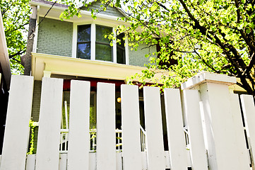 Image showing Front yard with white fence