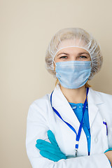 Image showing Young doctor in mask, gloves