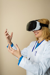 Image showing Girl in white coat at hospital