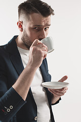 Image showing Portrait of stylish handsome young man with cup of coffee