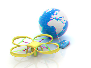 Image showing Quadrocopter Drone with Earth Globe and remote controller on a w