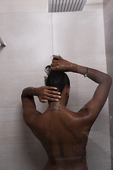 Image showing African American woman in the shower