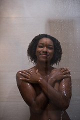 Image showing African American woman in the shower