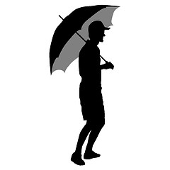 Image showing Black silhouettes of men under the umbrella