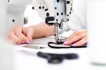 Image showing Sewing on a machine.  Sewing machine  Sewing. Sewing machine 