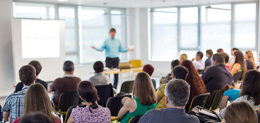 Image showing Speaker giving presentation on business conference.