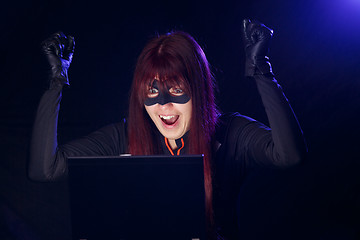 Image showing Hacker woman in black mask