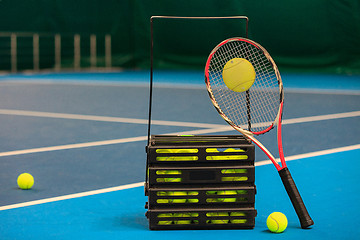 Image showing The tennis ball on a tennis court