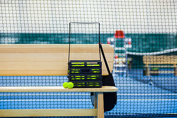 Image showing Close up view of tennis court through the net