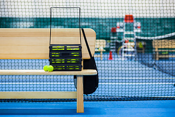 Image showing Close up view of tennis court through the net