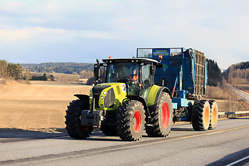 Image showing Claas Farm Tractor and Beet Harvester on Road