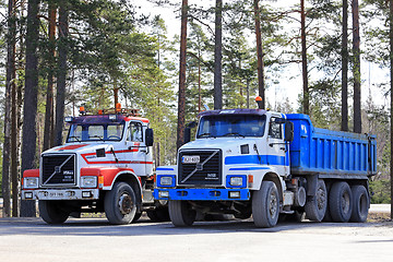 Image showing Two Classic Conventional Volvo N12 Trucks