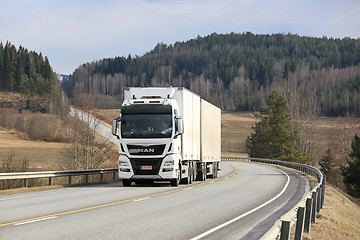 Image showing White MAN TGX D38 Cargo Truck on Scenic Road