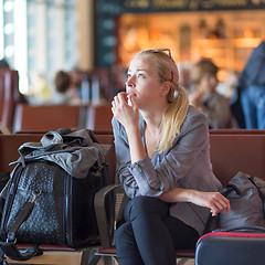 Image showing Woman waiting on airport terminal.