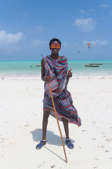 Image showing Traditonaly dressed black man on Paje beach, Zanzibar, Tanzania, East Africa.