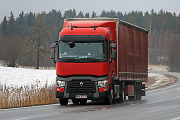 Image showing Red Renault Trucks T Semi Hauls Cargo in Winter