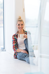 Image showing Portrait of a beautiful girl on the floor