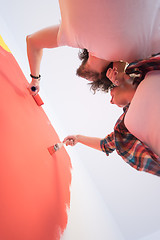 Image showing couple painting interior wall