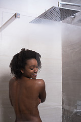 Image showing African American woman in the shower