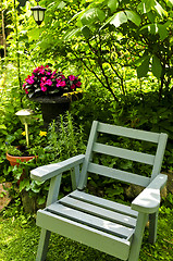 Image showing Chair in green garden